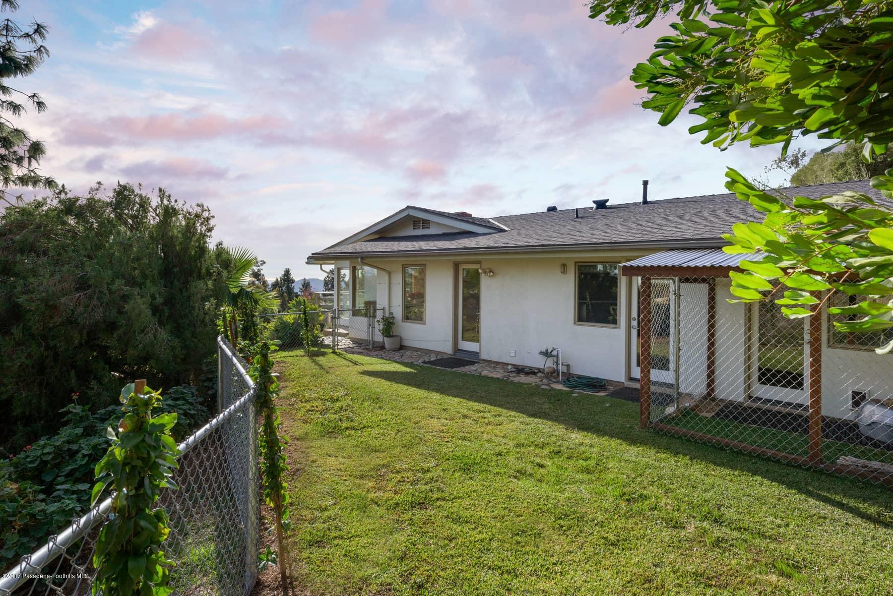 3430 Ellington Villa Drive Altadena, CA 91001 - Photo 46 of 49 a view of a house with backyard and garden