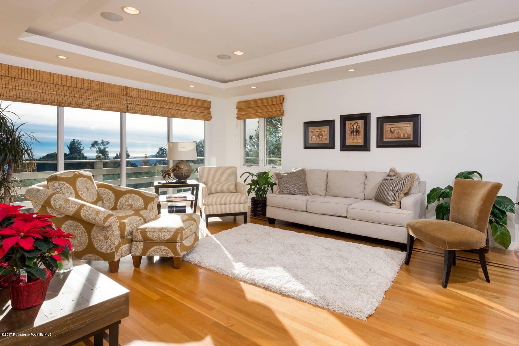 3430 Ellington Villa Drive Altadena, CA 91001 - Photo 6 of 49 a living room with furniture and a large window