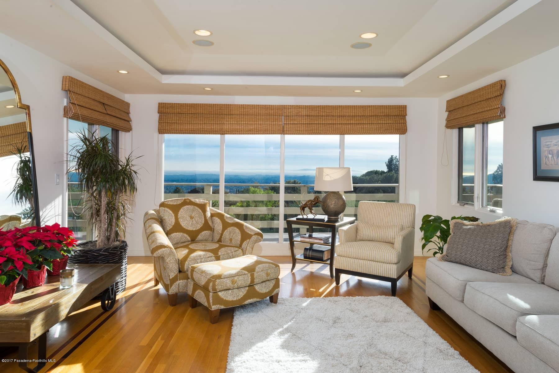 3430 Ellington Villa Drive Altadena, CA 91001 - Photo 7 of 49 a living room with furniture and a large window