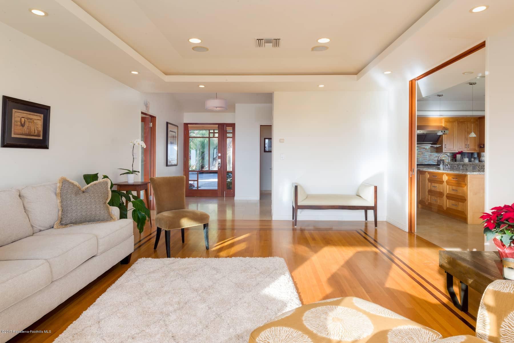 3430 Ellington Villa Drive Altadena, CA 91001 - Photo 8 of 49 a living room with furniture and a table