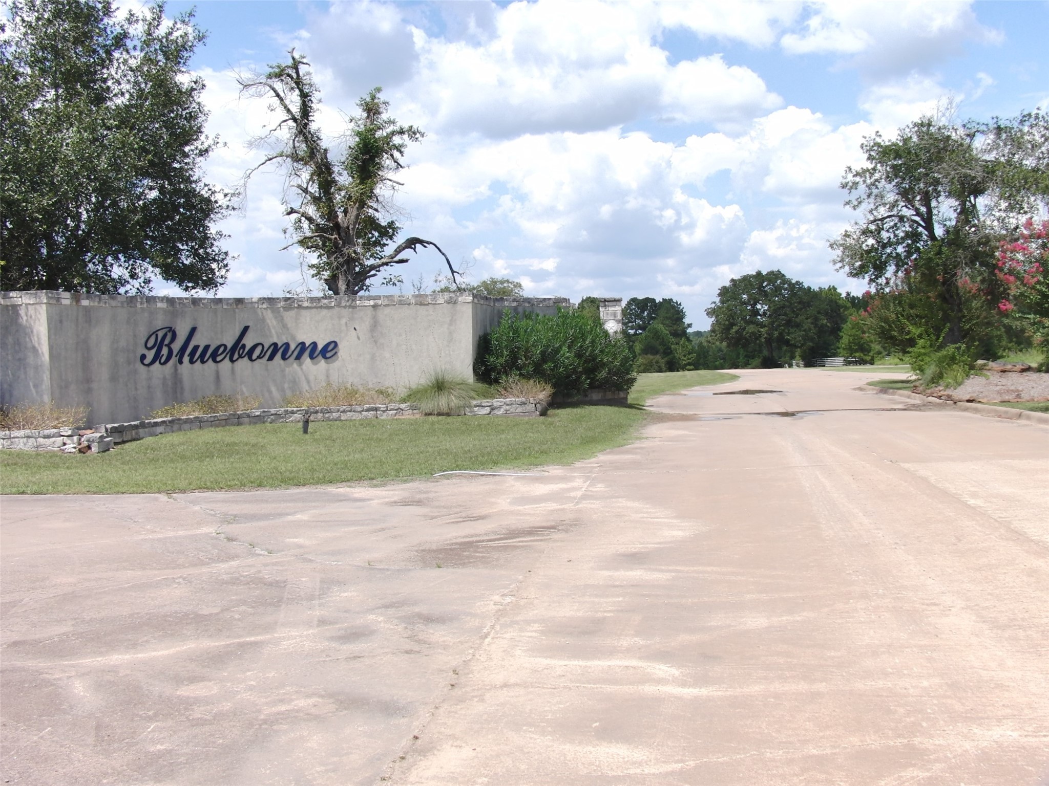 a sign board with parking space