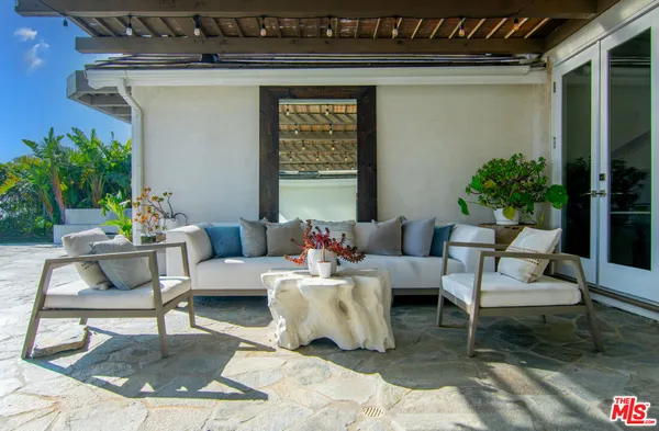 a view of a swimming pool with a garden