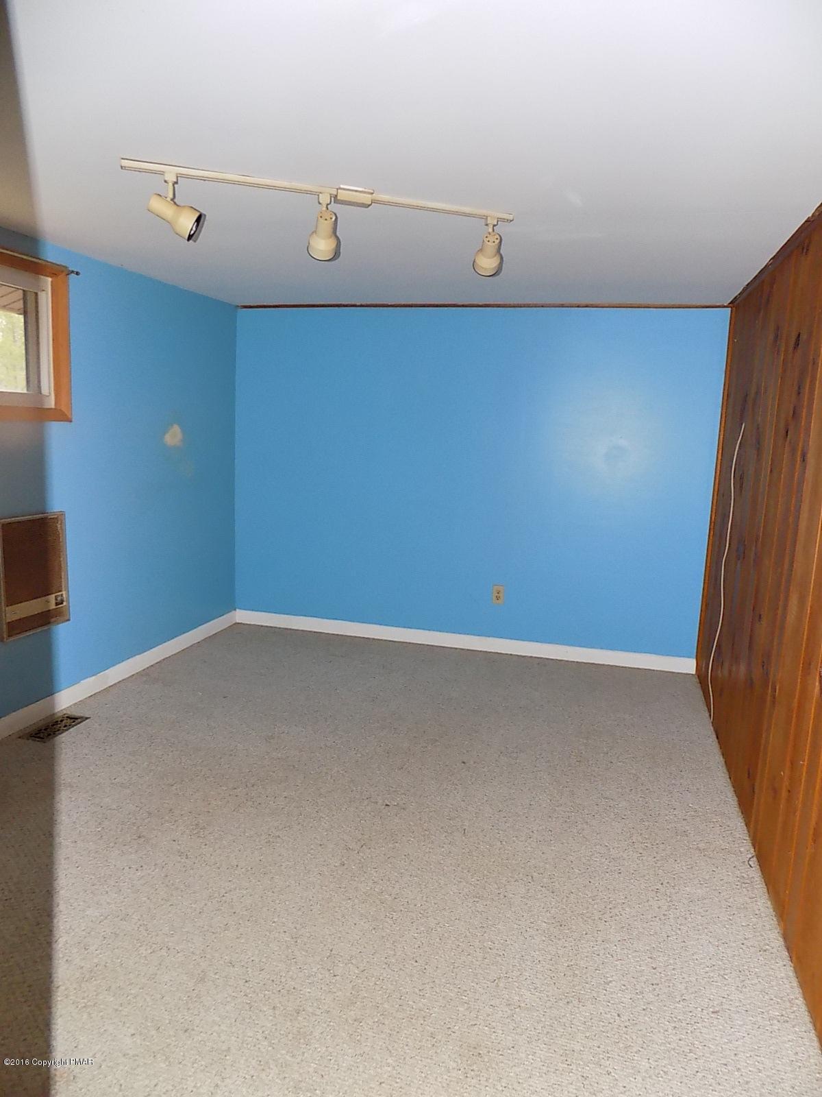 118 Beech Road Dingmans Ferry, PA 18328 - Photo 5 of 9 a view of an empty room