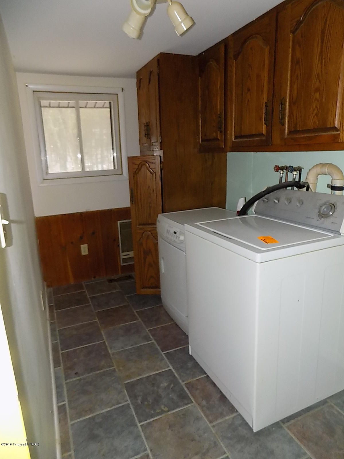 118 Beech Road Dingmans Ferry, PA 18328 - Photo 8 of 9 a utility room with dryer and washer