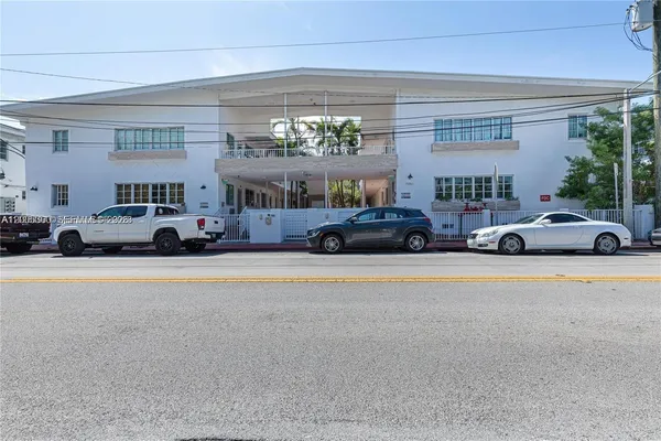 a cars parked in front of a building
