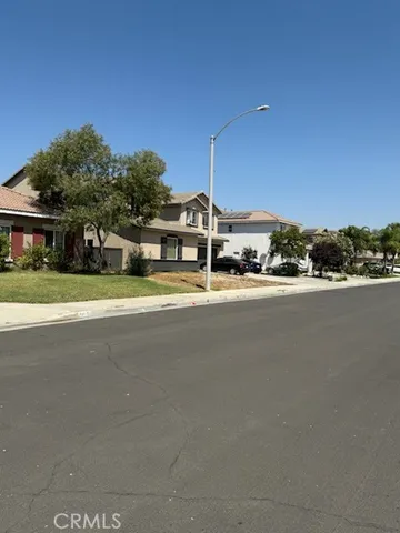 a view of a street with houses