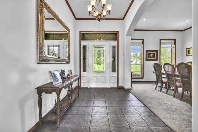 a view of a livingroom with furniture and windows
