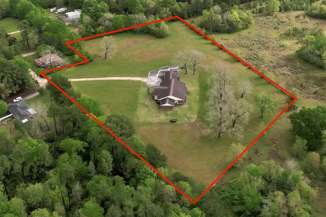 a view of swimming pool from a balcony