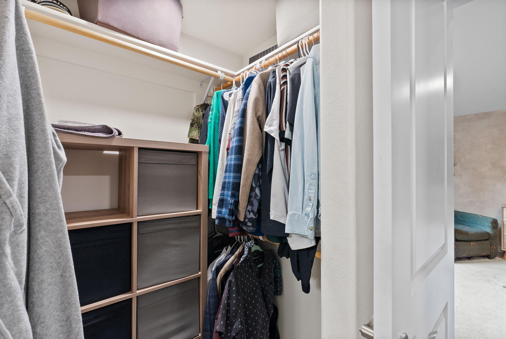 632 North Reed Street Sisters, OR 97759 - Photo 18 of 36 a view of walk in closet with clothes