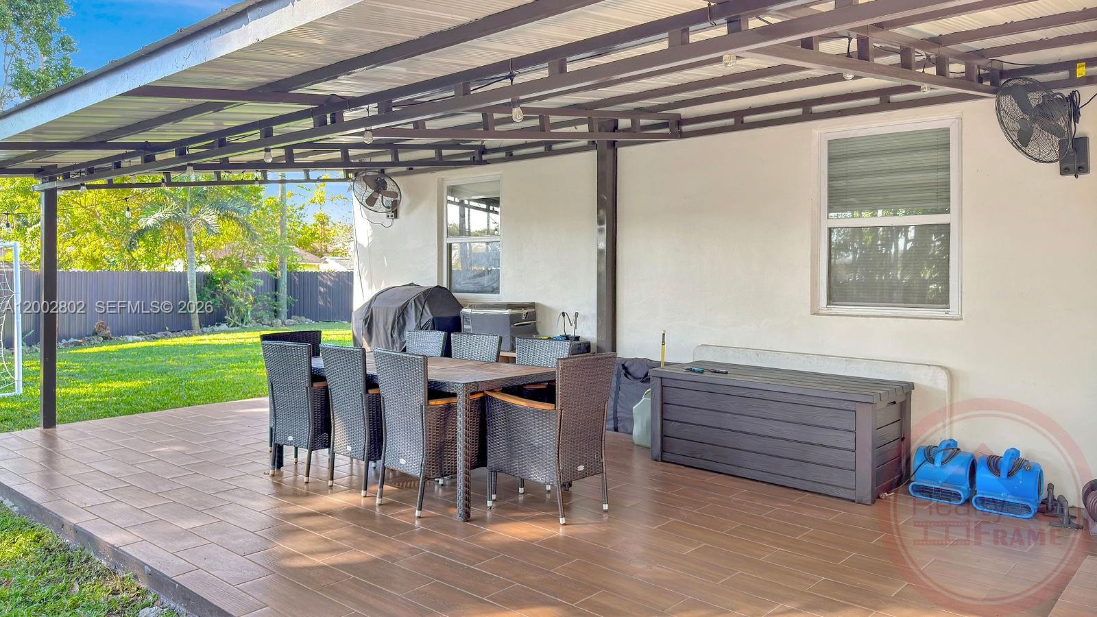 11240 Southwest 60th Terrace Miami, FL 33173 - Photo 2 of 19 a view of a porch with furniture and garden