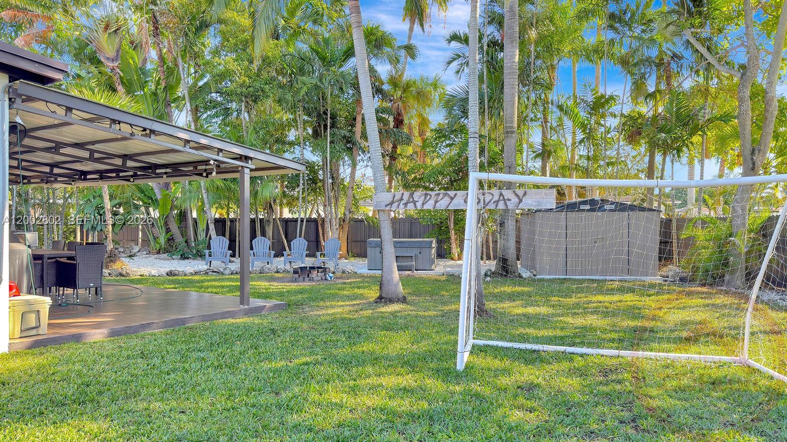 11240 Southwest 60th Terrace Miami, FL 33173 - Photo 10 of 19 a view of a backyard with swimming pool