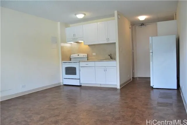 a view of kitchen with wooden floor