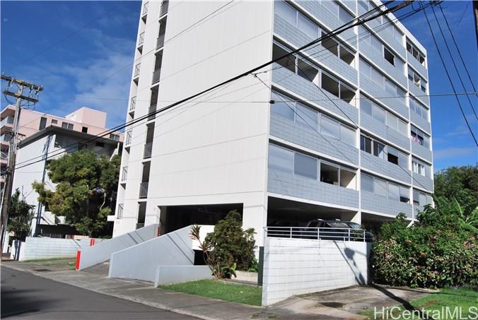 1718 Anapuni Street, Unit 502 Honolulu, HI 96822 - Photo 7 of 9 a view of a building with a street