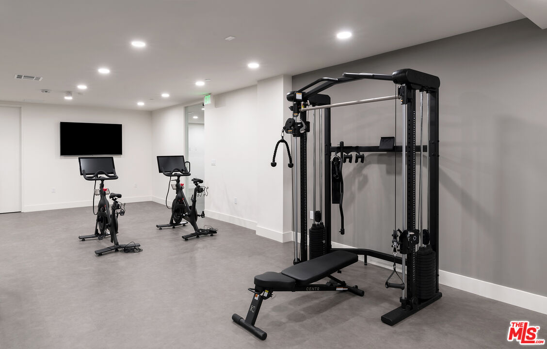 3649 Regal Place, Unit 307 Los Angeles, CA 90068 - Photo 18 of 24 a view of a room with gym equipment