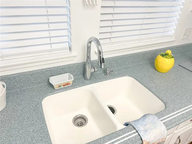 a view of a bathroom from a hallway