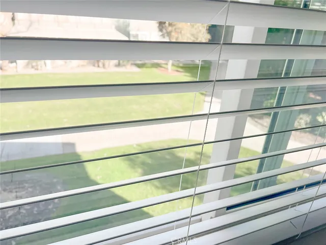 a bathroom with a sink vanity granite and toilet