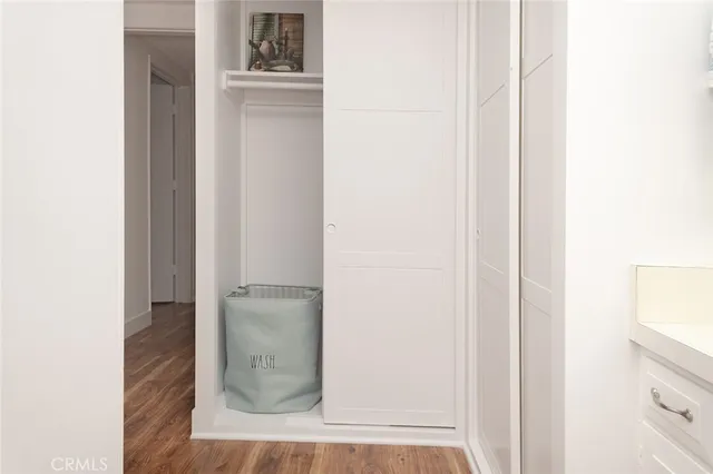 a bathroom with a sink a mirror and vanity