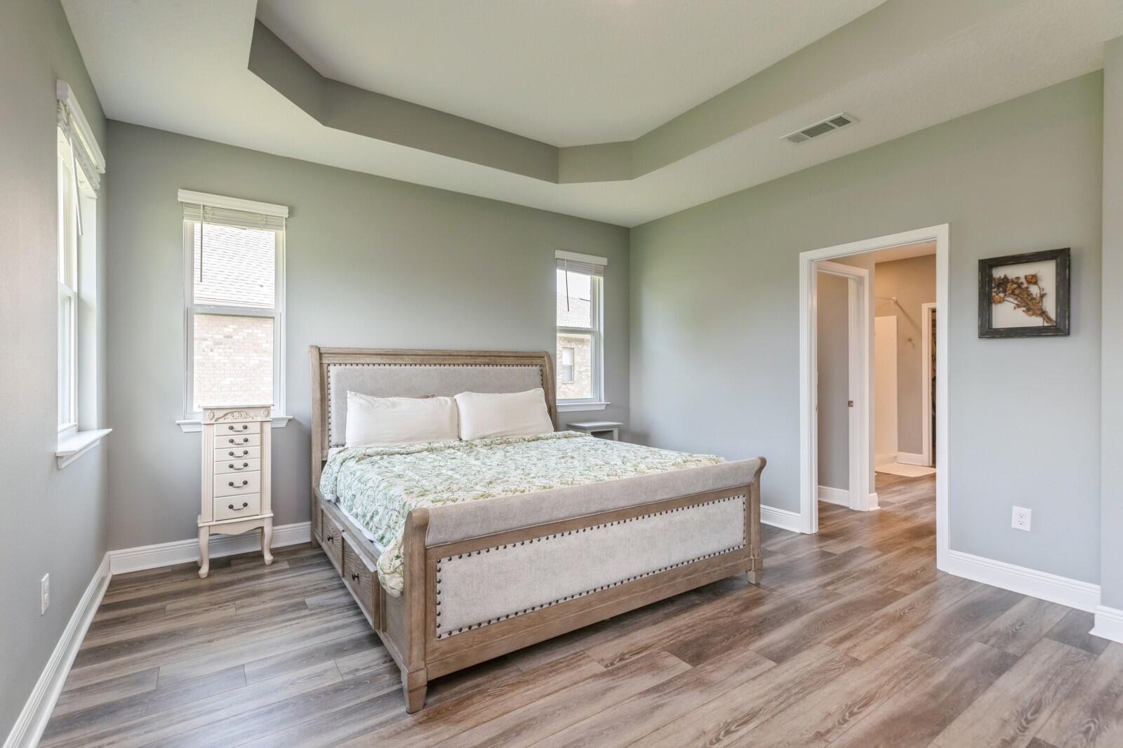 254 Concert Court Freeport, FL 32439 - Photo 19 of 69 a large bedroom with a bed and window