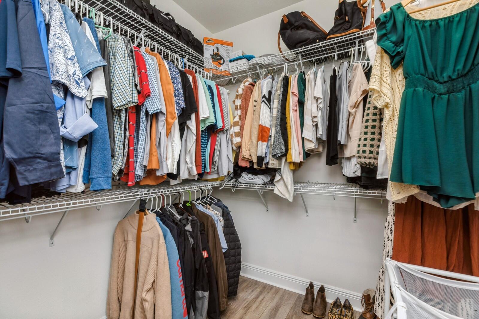 254 Concert Court Freeport, FL 32439 - Photo 23 of 69 a view of walk in closet with clothes and shoes