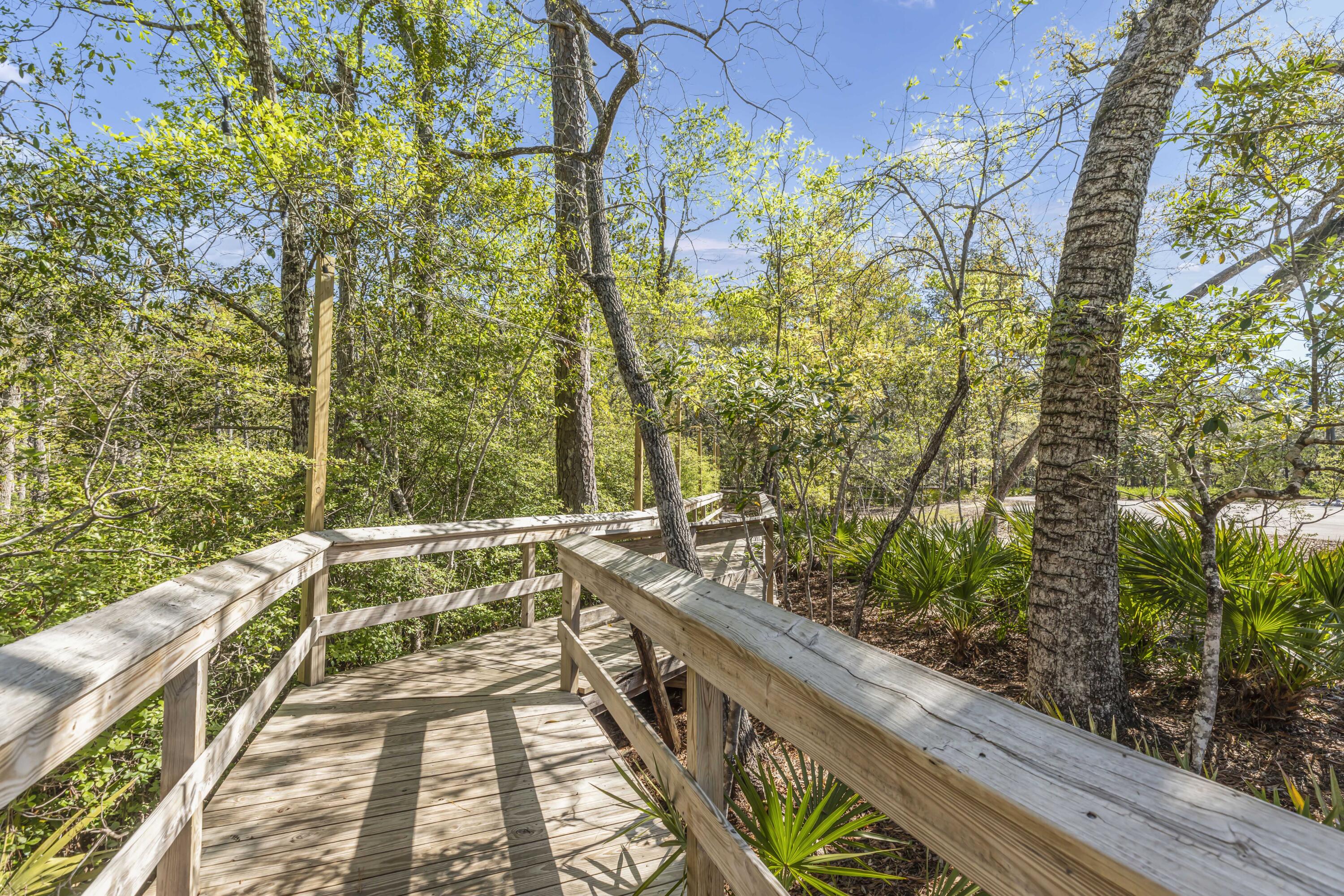 254 Concert Court Freeport, FL 32439 - Photo 68 of 69 a view of balcony with wooden floor and fence
