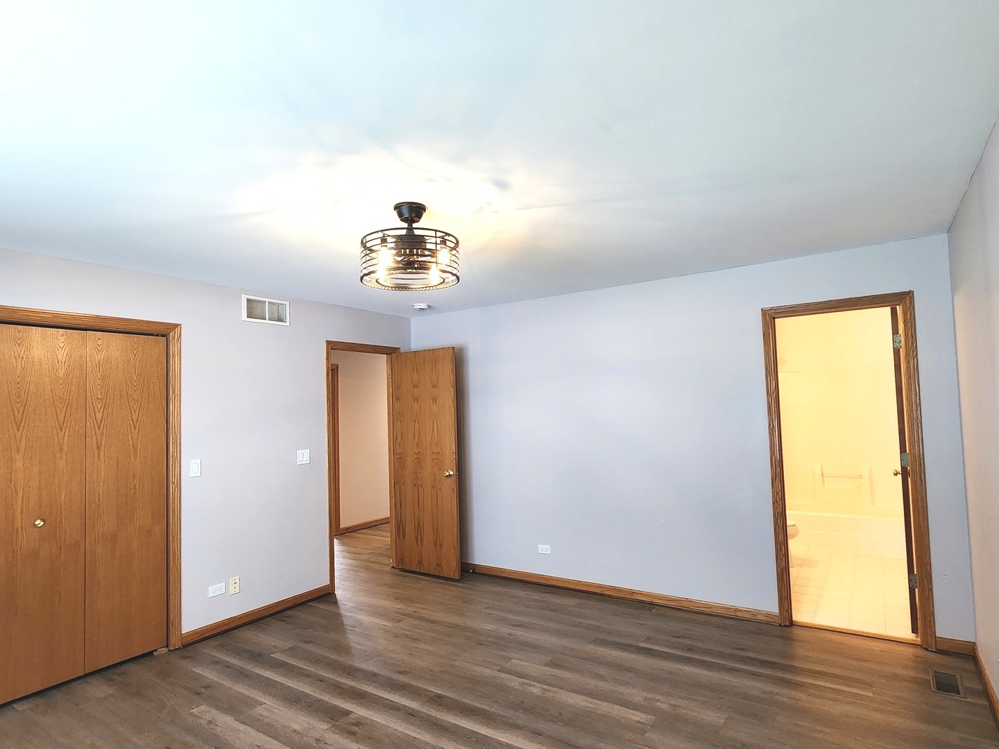532 Elizabeth Street Maple Park, IL 60151 - Photo 11 of 14 an empty room with wooden floor and a window
