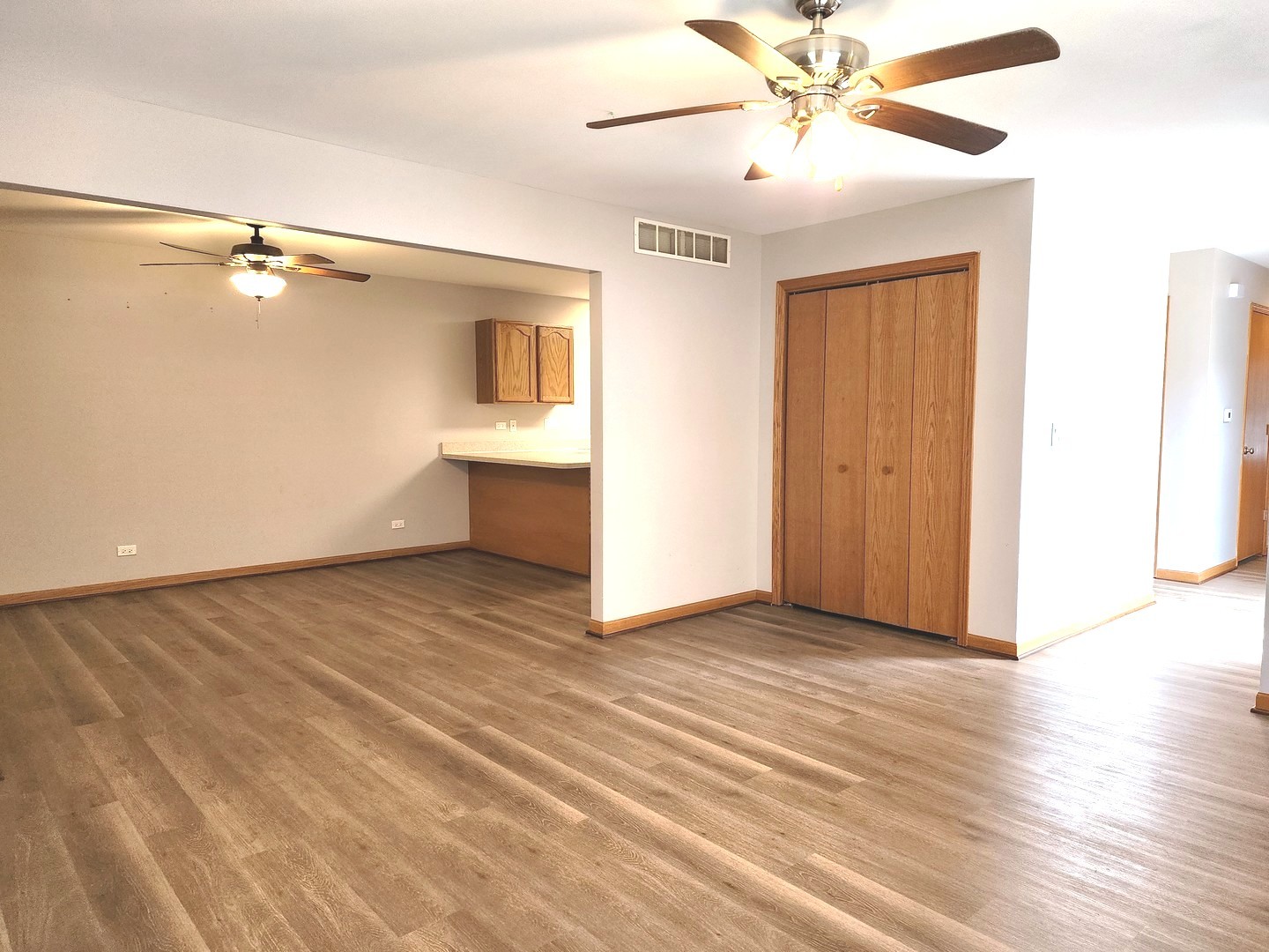 532 Elizabeth Street Maple Park, IL 60151 - Photo 4 of 14 a view of an empty room with a window