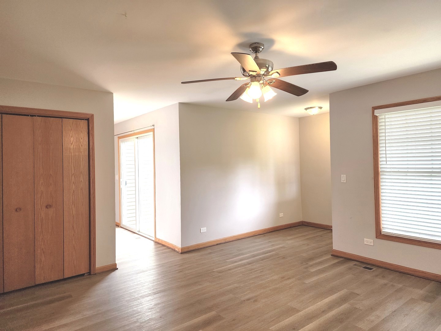 532 Elizabeth Street Maple Park, IL 60151 - Photo 5 of 14 wooden floor in an empty room with a window