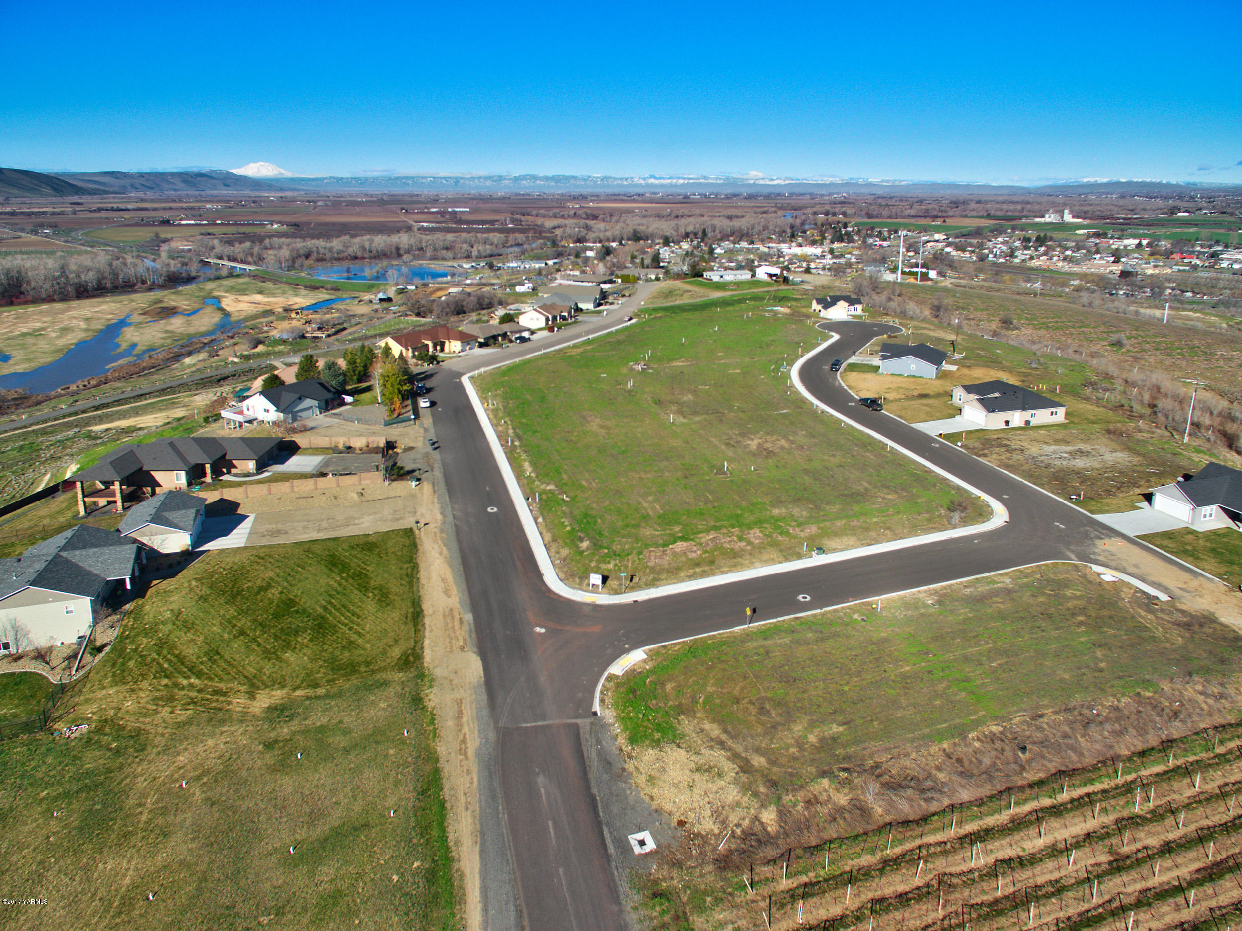 Nna Bagley Road, Unit 3 Granger, WA 98932 - Photo 1 of 7 an aerial view of residential houses with outdoor space