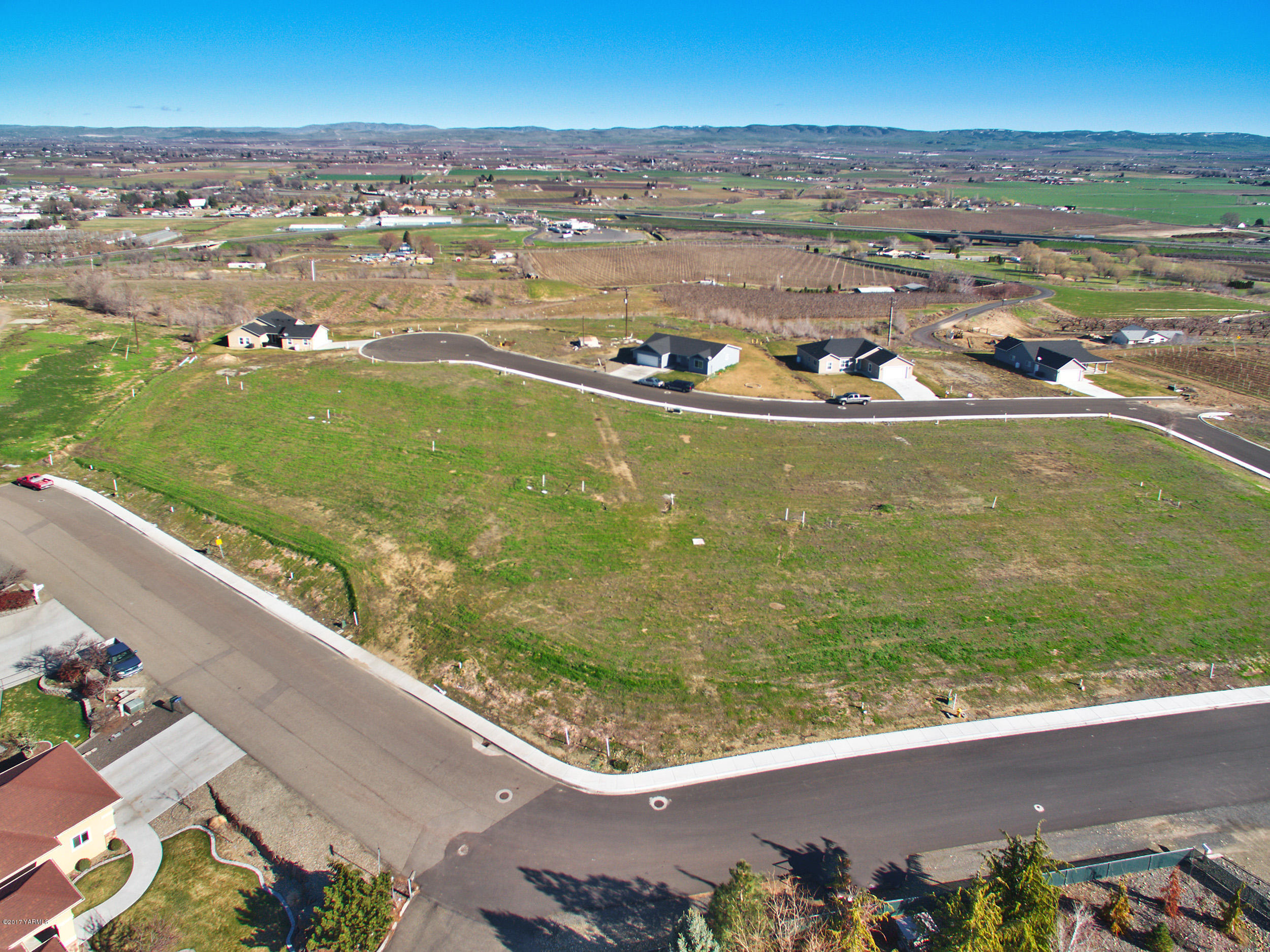 Nna Bagley Road, Unit 3 Granger, WA 98932 - Photo 4 of 7 an aerial view of a residential houses with outdoor space