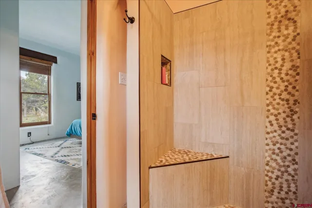 a view of a bathroom with a shower curtain