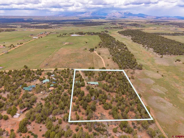 a view of a lake with a mountain in the background