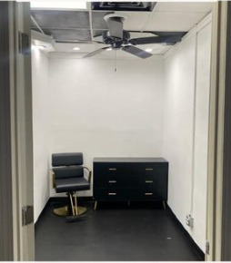 8727 South State Street, Unit 7 Chicago, IL 60619 - Photo 1 of 2 a room with a closet and a chair