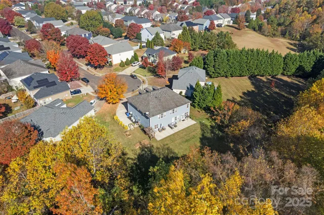 an aerial view of residential house with outdoor space