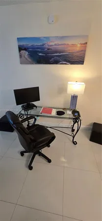 a bathroom with a sink mirror vanity and toilet