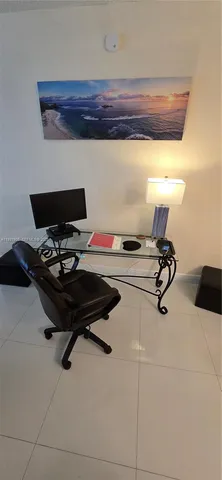 a bathroom with a sink mirror vanity and toilet