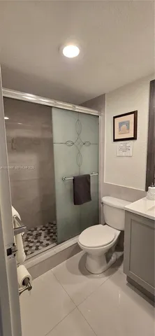 a kitchen with stainless steel appliances granite countertop a sink and a stove