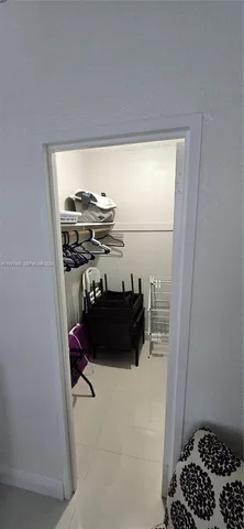 a kitchen with stainless steel appliances granite countertop a refrigerator a stove top oven a sink and dishwasher