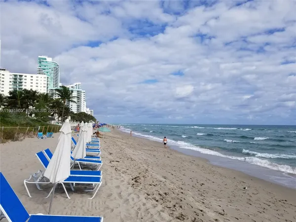 a view of a building with a garden