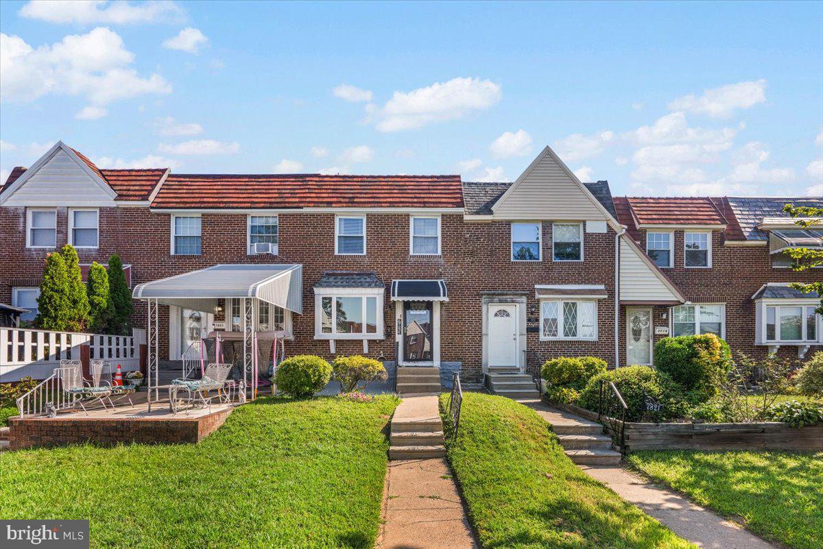 7823 Forrest Avenue Philadelphia, PA 19150 - Photo 1 of 27 a front view of a house with a yard