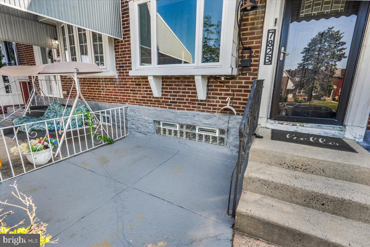 7823 Forrest Avenue Philadelphia, PA 19150 - Photo 17 of 27 a view of a brick building with many windows