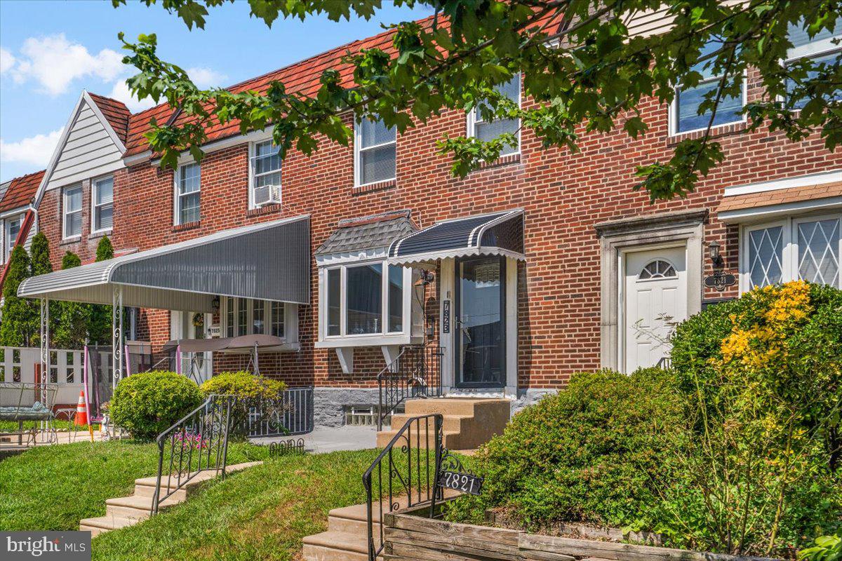 7823 Forrest Avenue Philadelphia, PA 19150 - Photo 24 of 27 front view of a house with a yard