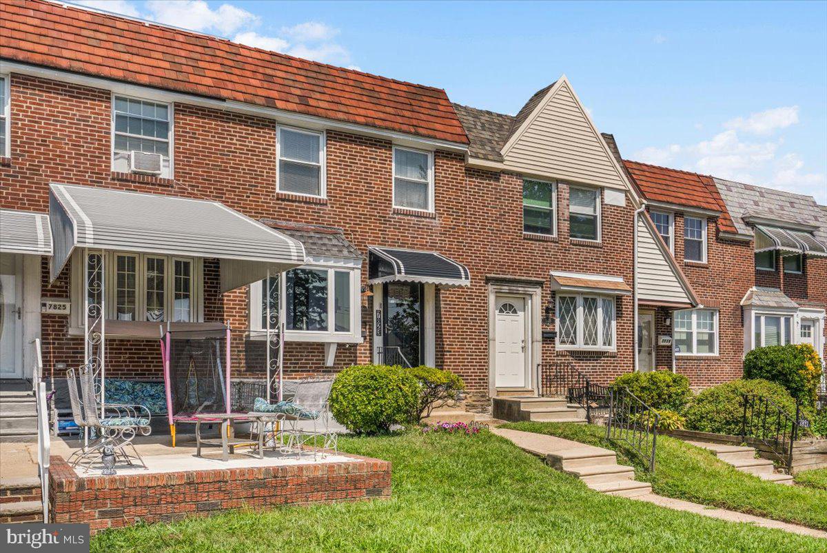7823 Forrest Avenue Philadelphia, PA 19150 - Photo 25 of 27 front view of a house with a yard
