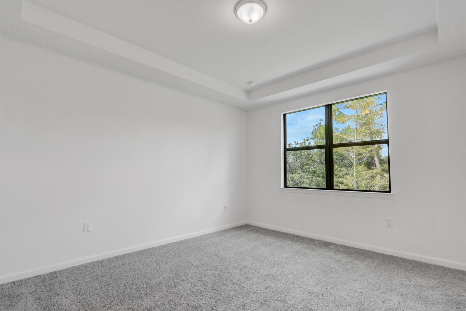 287 Southwest Sally Way Stuart, FL 34997 - Photo 18 of 41 an empty room with windows