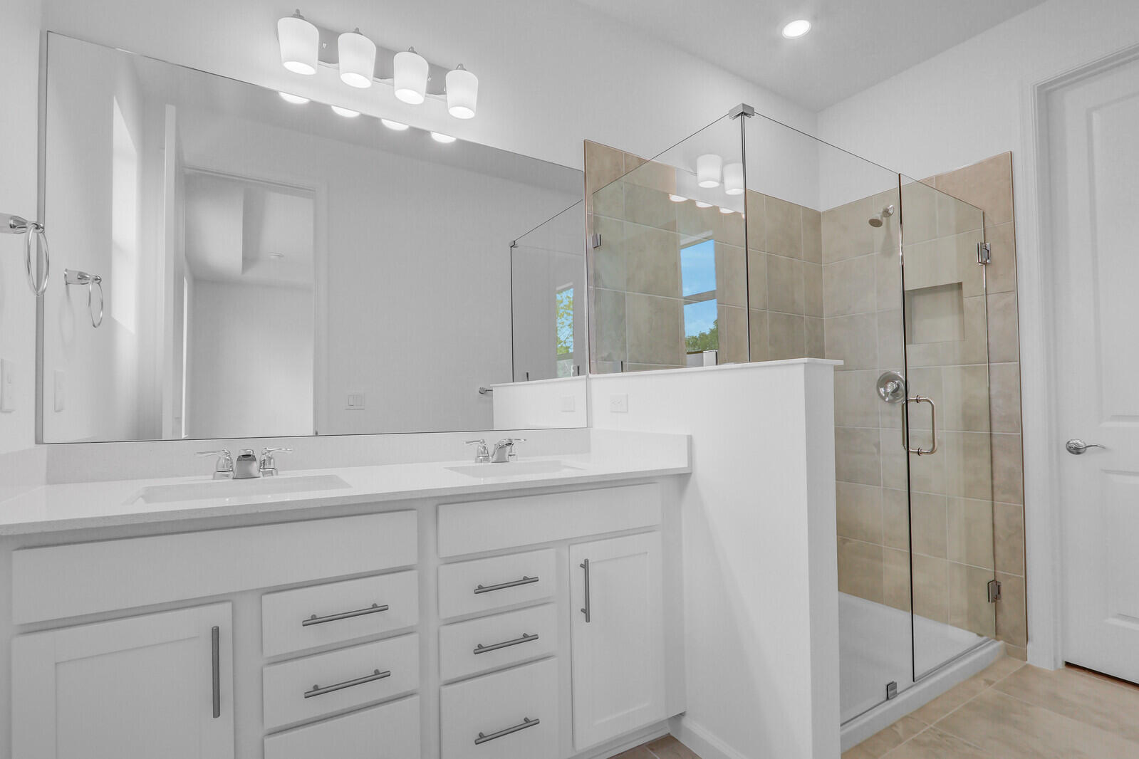 287 Southwest Sally Way Stuart, FL 34997 - Photo 20 of 41 a bathroom with a double vanity sink mirror and shower