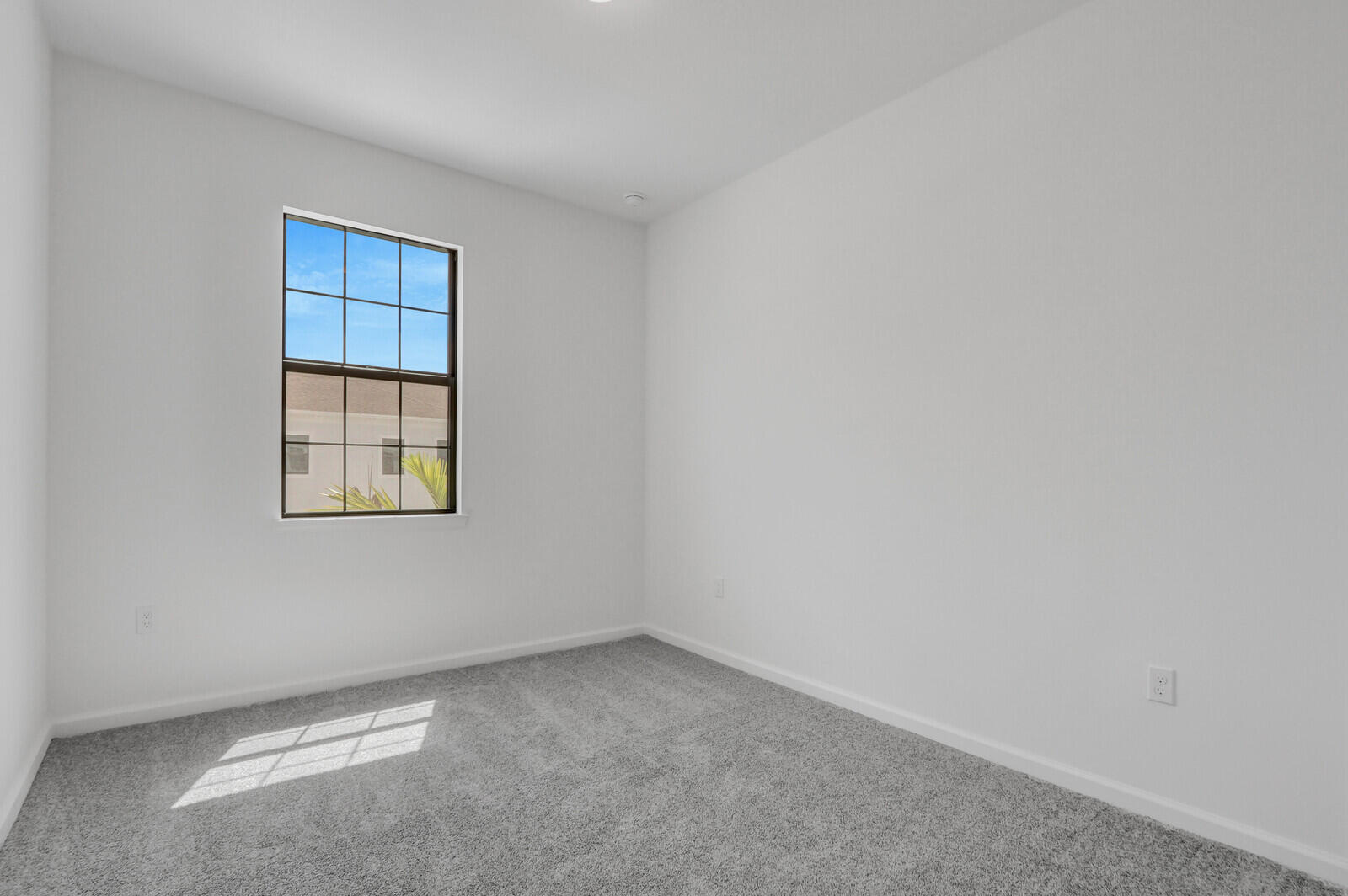 287 Southwest Sally Way Stuart, FL 34997 - Photo 22 of 41 an empty room with windows