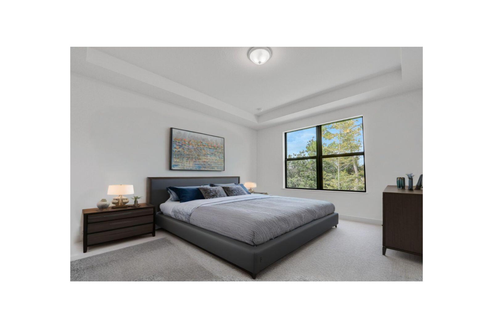 287 Southwest Sally Way Stuart, FL 34997 - Photo 3 of 41 a living room with a bed and a window