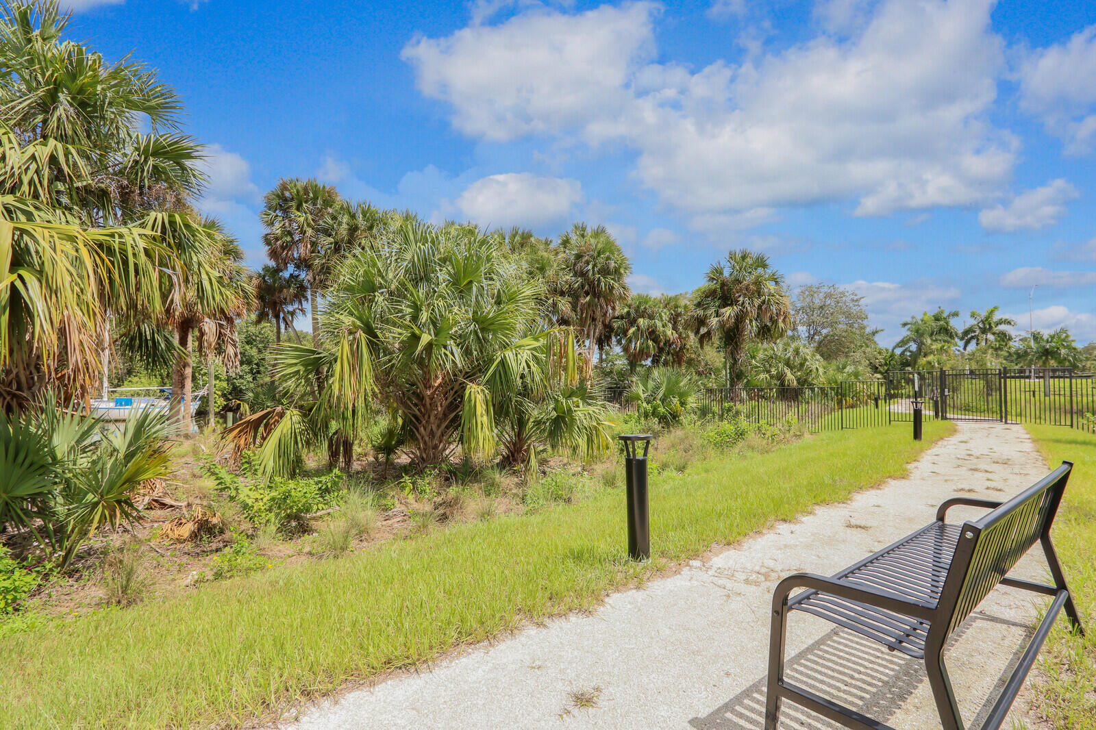 287 Southwest Sally Way Stuart, FL 34997 - Photo 34 of 41 a view of a lake with outdoor space