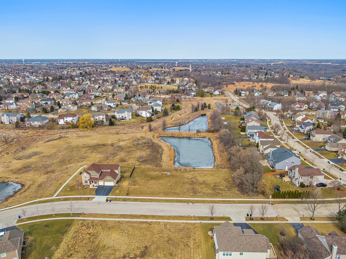 1540 Westbourne Parkway Algonquin, IL 60102 - Photo 3 of 10 an aerial view of residential houses with outdoor space