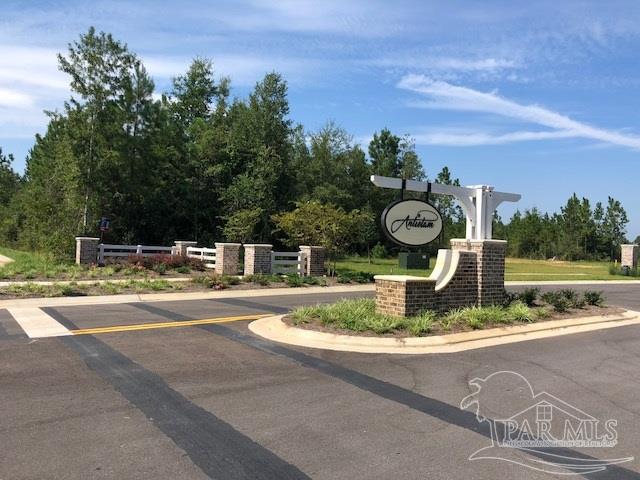 7787 Burnside Loop Pensacola, FL 32526 - Photo 3 of 32 a view of a house with a swimming pool and a yard