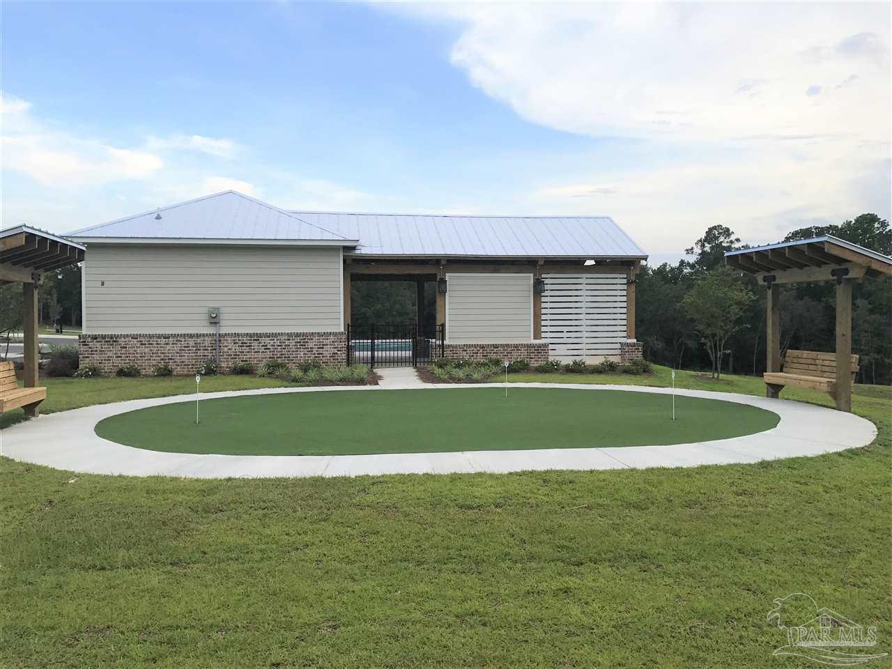 7787 Burnside Loop Pensacola, FL 32526 - Photo 21 of 32 a view of outdoor space yard and swimming pool